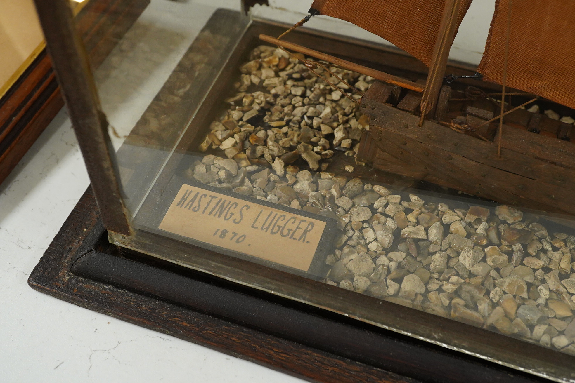 A cased scratch built model of a Hastings lugger of 1870, 40cm wide